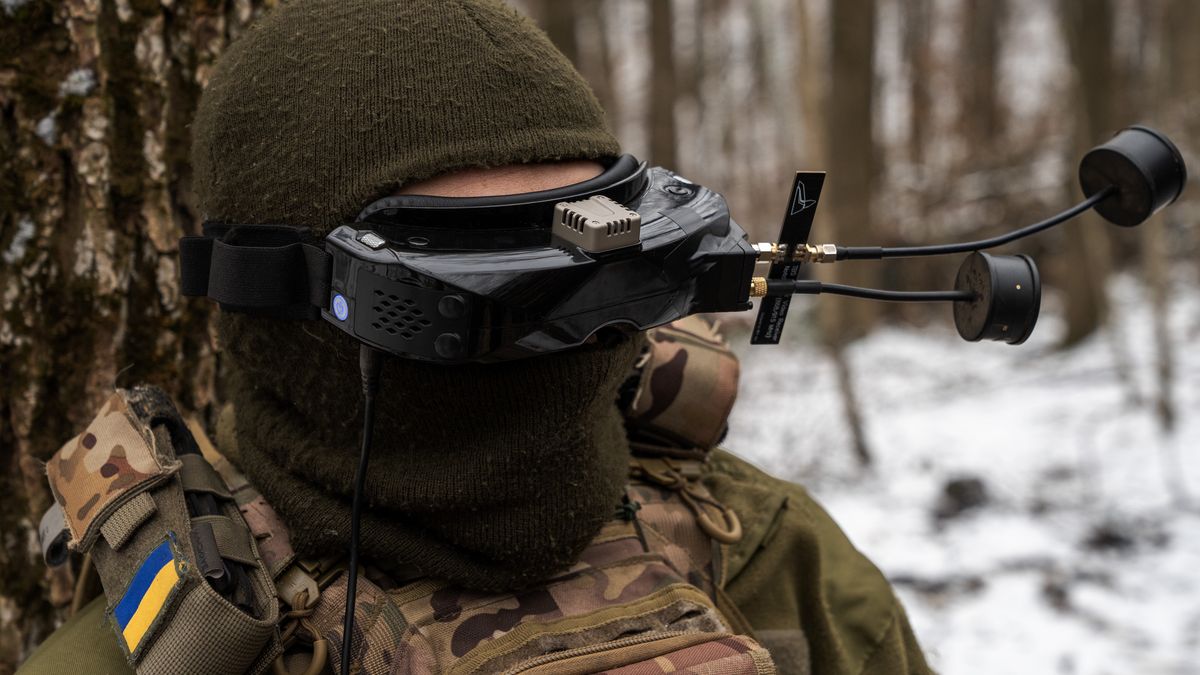 KHARKIV OBLAST, UKRAINE - JANUARY 16: An Ukrainian soldier operates FPV drone wearing drone control goggles in a defensive position near the Russian border in the Kharkiv Oblast, Ukraine on January 16, 2025. (Photo by Jose Colon/Anadolu via Getty Images)