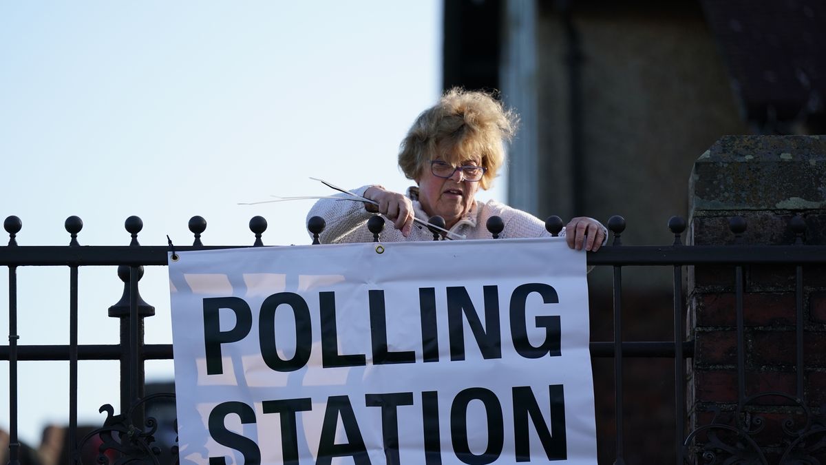 KIRBY SIGSTON, ENGLAND - JULY 4: A woman prepares the polling station in the constituency of Richmond and Northallerton as polls open in the General Election on July 4, 2024 in Kirby Sigston, England. Voters in 650 constituencies across the UK are electing members of Parliament to the House of Commons via the first-past-the-post system.  Rishi Sunak announced the election on May 22, 2024. The last general election that took place in July was in 1945, following the Second World War, which resulted in a landslide victory for Clement Attlee's Labour Party. (Photo by Ian Forsyth/Getty Images)