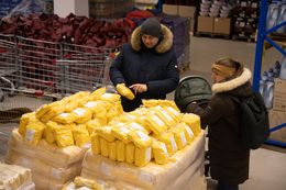 Shoppers browse a bag of grains inside a Mere discount supermarket, operated by Svetofor Group PAO, in Riga, Latvia, on Friday, Dec. 2, 2022. European Central Bank Vice President Luis de Guindos expects euro-area inflation to stay at current levels for a few more months. Photographer: Andrey Rudakov/Bloomberg via Getty Images