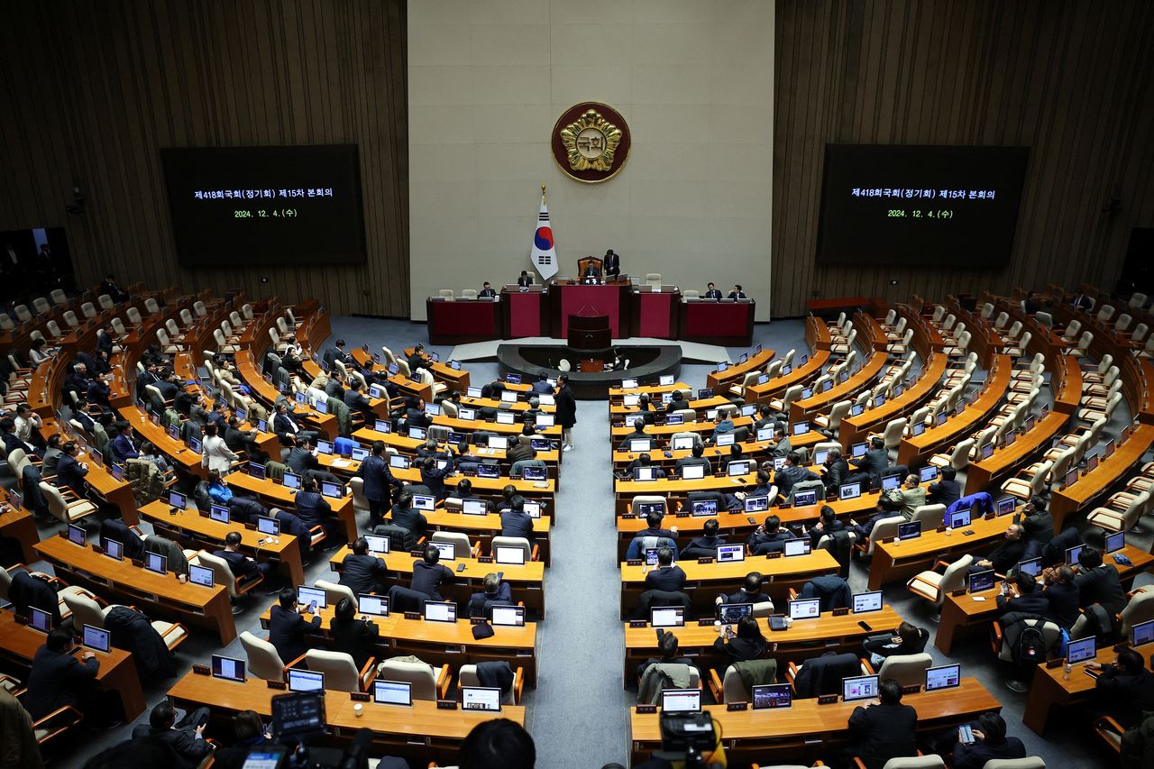 South Korean parliament defies military to end emergency