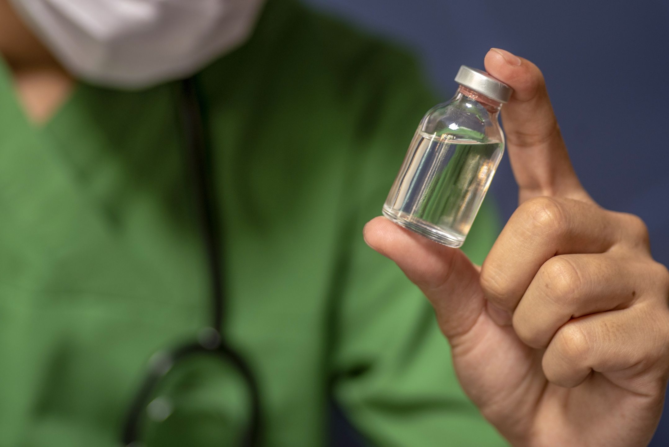 Doctor hold syringe prepare for injection,Ewand