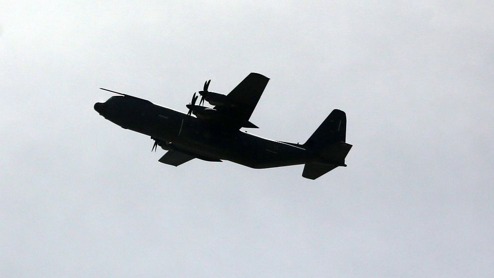 A Royal Jordanian Air Force C-130 is flying above the besieged Palestinian territory on March 28, 2024, amid the ongoing conflict between Israel and the militant group Hamas. (Photo by Majdi Fathi/NurPhoto via Getty Images)