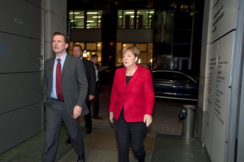 Steffen Seibert i Angela Merkel