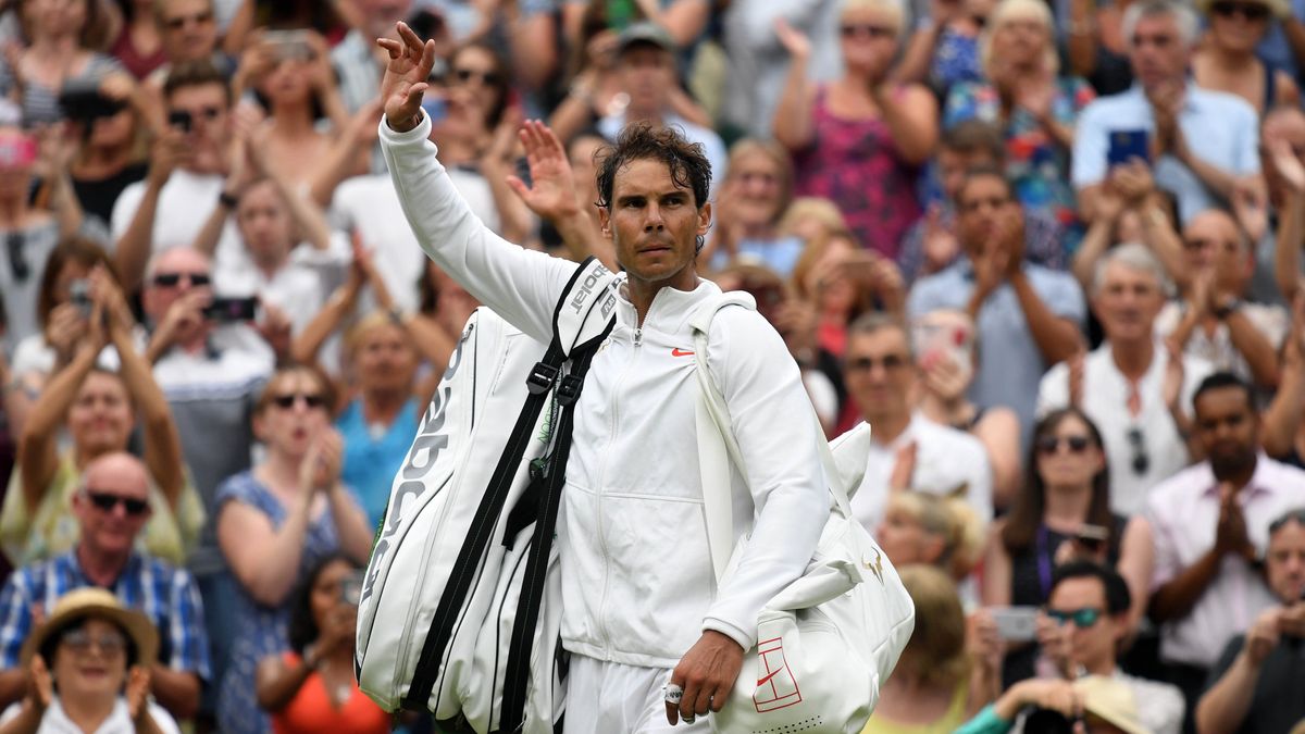 (FILE) - Rafael Nadal of Spain waves to the crowd after losing his semi final match against Novak Djokovic of Serbia at the Wimbledon Championships at the All England Lawn Tennis Club, in London, Britain, 14 July 2018 (reissued 10 October 2024). On 10 October 2024, Rafael Nadal of Spain announced that he will retire from professional tennis. Since winning his first ever title in 2004, Nadal won 92 titles, including 22 grand slams and a record 14 French Open titles. EPA/NEIL HALL EDITORIAL USE ONLY/NO COMMERCIAL SALES *** Local Caption *** 54490523 Dostawca: PAP/EPA.
