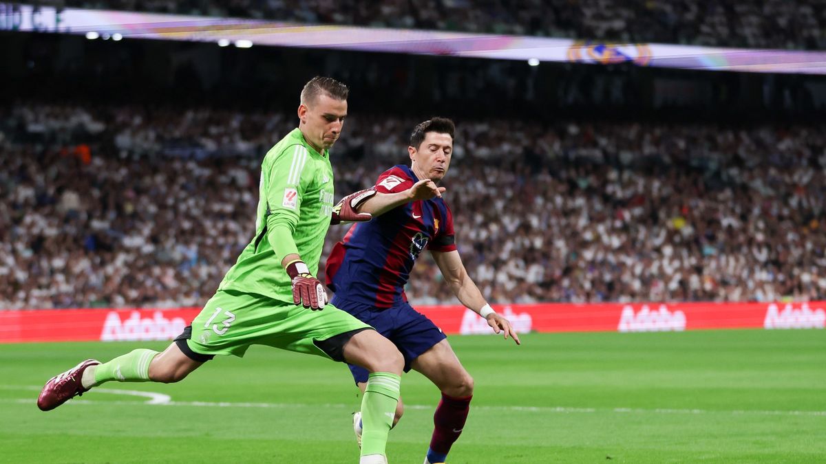 Getty Images / Flor Tan Jun / Na zdjęciu: Andrij Łunin i Robert Lewandowski