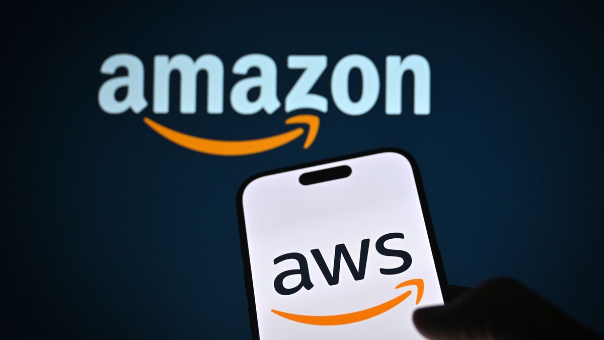 ANKARA, TURKIYE - OCTOBER 20: In this photo illustration the Amazon logo is displayed on a mobile phone screen in front of the Amazon company icons in Ankara, Turkiye on October 20, 2025. (Photo by Hakan Nural/Anadolu via Getty Images)