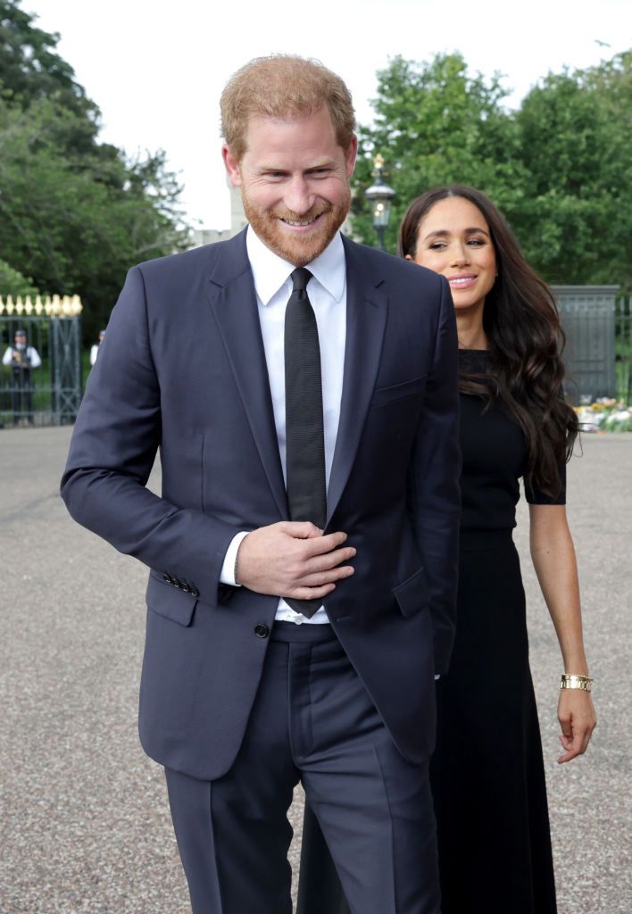 The Prince and Princess of Wales Accompanied By The Duke And Duchess Of Sussex Greet Wellwishers Outside Windsor CastleWINDSOR, ENGLAND - SEPTEMBER 10: Prince Harry, Duke of Sussex and Meghan Duchess of Sussex speak with well-wishers at Windsor Castle on September 10, 2022 in Windsor, England. Crowds have gathered and tributes left at the gates of Windsor Castle to Queen Elizabeth II, who died at Balmoral Castle on 8 September, 2022. (Photo by Chris Jackson - WPA Pool/Getty Images)Chris Jackson