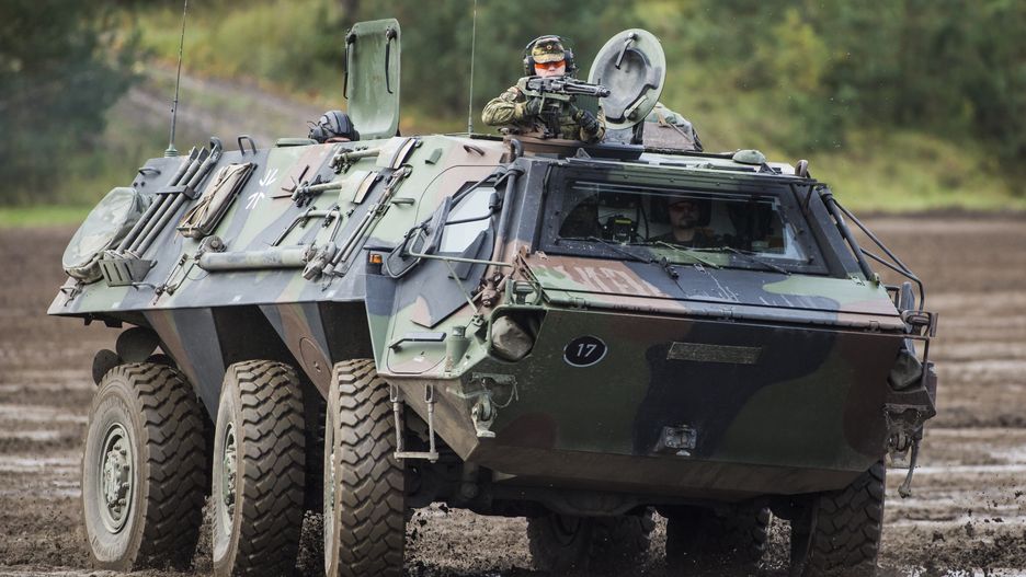 German land forces
MUNSTER, GERMANY - OCTOBER 13: Transport tank 'Fuchs'. Shot during an exercise of the land forces on October 13, 2017 in Munster, Germany. (Photo by Florian Gaertner/Photothek via Getty Images)
Florian Gaertner
Landstreitkraefte, land forces, Uebung, exercise, practice, Truppenuebung, field exercise, Truppenuebungsplatz, training area, military training ground, Panzer, tank, Transportpanzer, transport tank, Radpanzer, wheel tank, camouflage, Schlamm, Matsch, mud, Aussen, Aussenaufnahme, Exterior, exterior shot, Am Tag, tagsueber, Tageslicht, On the day, daytime, daylight, Wald, Waelder, Baum, Baeume, Forest, woods, tree, trees, Querformat, QF, Horizontal, Von Vorne, From Front, Feature, Dreck, dreckig, dreckige, dreckiges, dreckiger, Schmutz, schmutzig, schmutzige, schmutziger, schmutziges, Dirty, Gefahr, gefaehrlich, Danger, dangerous, Gegner, Adversary, Konflikt, Conflict, Militaer, Military, Armee, Army, Ausruestung, militaerische, Equipment, Bundeswehr, German Army Bundeswehr, Grundausbildung, Basic Training, Heer, Streitkraefte, Streitkraft, Armed forces, armed force, Wehrdienst, Wehrpflicht, Wehrpflichtige, Military service, conscripts, Krieg, War, Manoever, Maneuver, Maneuver Maneuver, Militaereinsatz, Militaereinsaetze, Military deployment, military operations, Ruestung, Waffen, Weapons, Fahrzeug, Fahrzeuge, Vehicle, vehicles, Uniform, Uniformen, Uniforms, Soldat, Soldaten, Soldier, soldiers, Waffe, Weapon, Armor, Kaukasier, Caucasian, Mann, Maennlich, Maennlicher, Men, Males, erwachsen, erwachsene, erwachsener, erwachsenes, adult, Adults, Maenner maennlich, Men Males