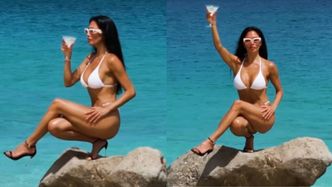 Nicole Scherzinger w białym bikini i obcasach balansuje na skale i popija martini. Robi wrażenie?