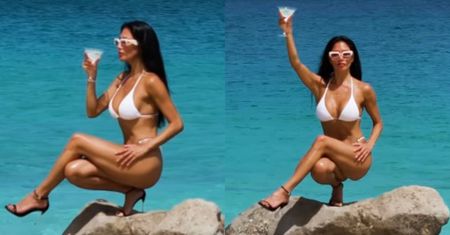 Nicole Scherzinger w białym bikini i obcasach balansuje na skale i popija martini. Robi wrażenie?