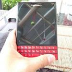 Czerwony BlackBerry Passport na zdjęciach