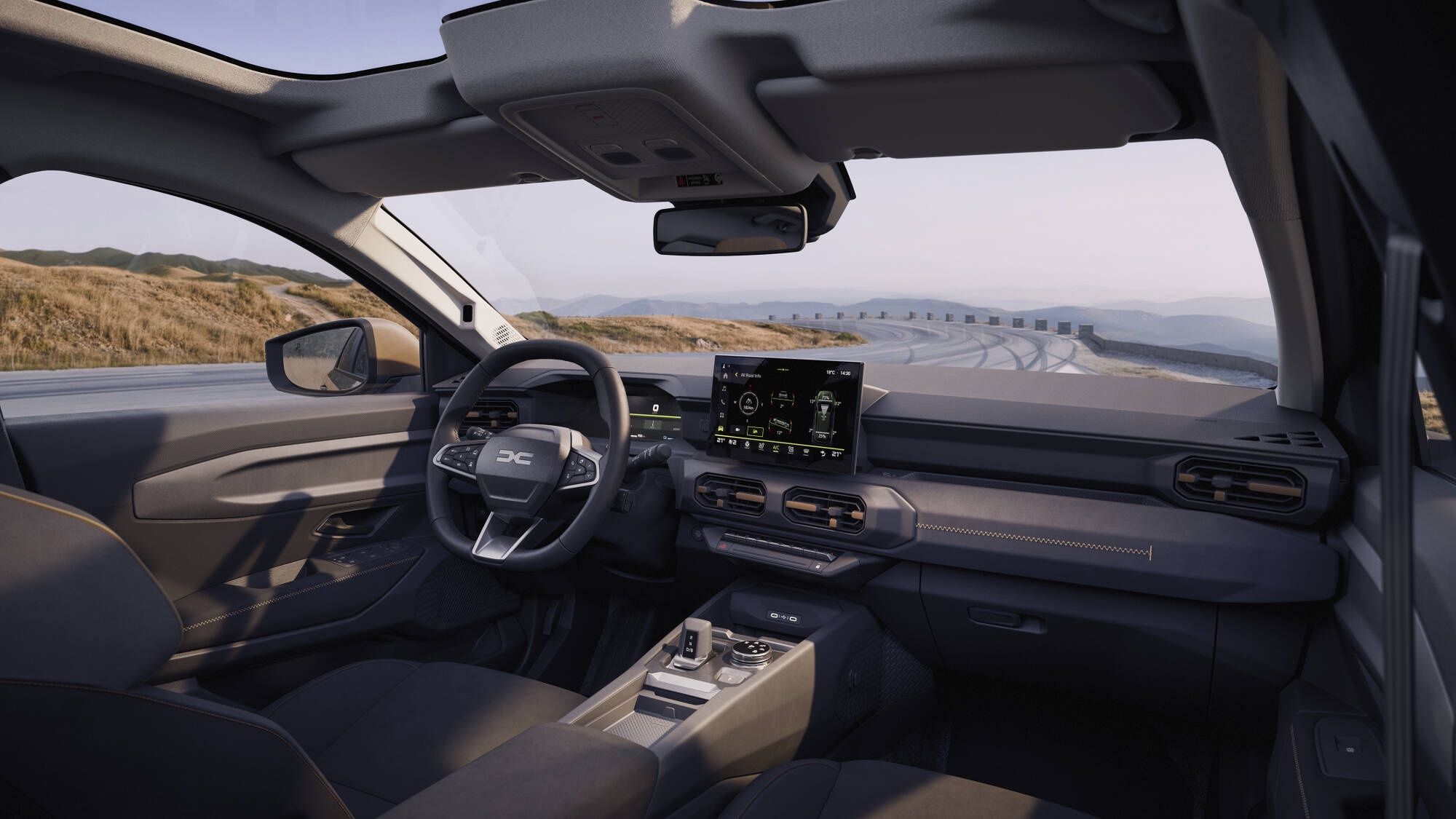 DACIA STRIKER (DB3F1)AMBIANCE TEP, COMMANDE ROTARY, CONSOLE CENTRALE, E-SHIFTER, ECRAN, MONTAGNE, NEIGE, PLAFONNIER, PLANCHE DE BORD, RETROVISEUR INTERIEUR, SELLERIE, STYLE DE VIE, VEHICULE HYBRIDE, VIRAGE, VOLANT