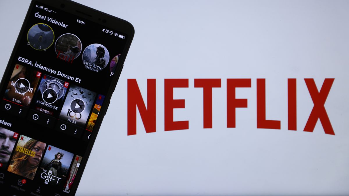 ANKARA, TURKEY - JULY 13: In this photo illustration, the logo of Netflix is displayed on a laptop screen and the application is displayed on a smart phone screen in Ankara, Turkey on July 13, 2020. (Photo by Esra Hacioglu/Anadolu Agency via Getty Images)