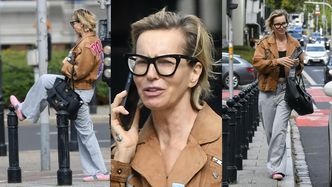 Znudzona Paulina Smaszcz z torebką za 15 tysięcy złotych wyżywa się na słupku miejskim w oczekiwaniu na taksówkę