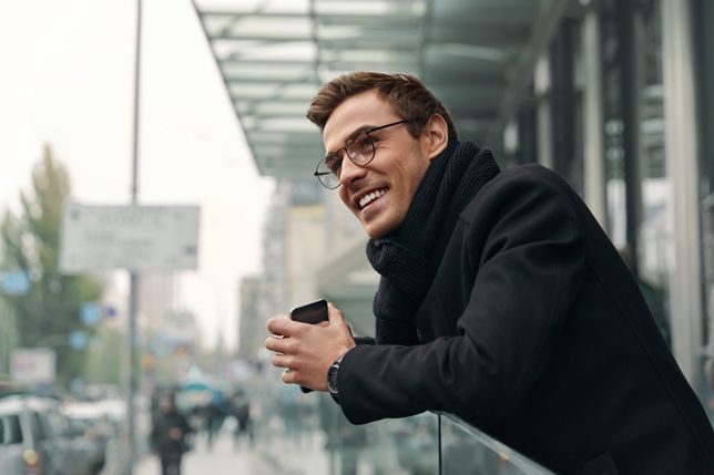 Young european businessman looking on modern cityYoung smiling european businessman standing with mobile phone and looking on modern city. Concept of modern successful man. Handsome stylish guy wearing scarf, coat and glasses. DaytimeVadym Drobotman, person, guy, young, caucasian, success, successful, european, emotion, emotional, trendy, style, stylish, hipster, modern, fashion, fashionable, elegant, elegance, profession, professional occupation, work, job, working, business, businessman, executive, corporate, manager, outdoor, outdoors, city, coat, scarf, glasses, town, urban, formal clothes, cold weather, business lifestyle, brown hair, young man, adult, city life, office worker, smiling, smile, hold, holding, looking, man, person, guy, young, caucasian, success, successful, european, emotion, emotional, trendy, style, stylish, hipster, modern, fashion, fashionable, elegant, elegance, profession, professional occupation, work, job, working, business, businessman, executive, corporate, manager, outdoor, outdoors, city, coat, scarf, glasses, town, urban, formal clothes, cold weather, business lifestyle, brown hair, young man, adult, city life, office worker, smiling, smile, hold, holding
