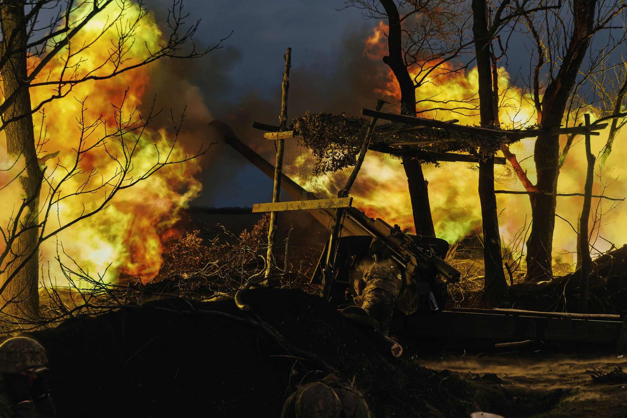 DONETSK OBLAST, UKRAINE - JULY 1: Ukrainian military fire from a 122-mm howitzer D-30 is seen on July 1, 2023 in Donetsk Oblast, Ukraine. On 24 February 2022, Russia invaded Ukraine in an escalation of the Russian-Ukrainian war that started in 2014. The full-scale invasion is the largest military attack in Europe since World War II. (Photo by Oleg Palchyk/Global Images Ukraine via Getty Images)