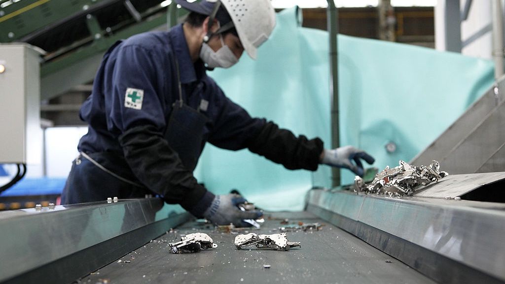 Hitachi Develops Machinery To Recycle Rare Earths
A worker sorts magnetic parts containing rare earth magnets, from other material collected from disassembled hard drives, at Hitachi Plant Technologies Ltd.'s Matsudo research laboratory in Matsudo City, Chiba Prefecture, Japan, on Monday, Dec. 6, 2010. Hitachi Ltd. said it developed machinery to harvest rare earth metals from discarded hard-disk drives and compressors as electronics makers seek to reduce their reliance on Chinese supply. Photographer: Kiyoshi Ota/Bloomberg via Getty Images
Bloomberg
ASIA; ASIAN; JAPANESE, COMPUTER, METALS, PARTS, RARE EARTH, RECYCLE;RECYCLING, RESOURCES, TECH, TECHNOLOGY