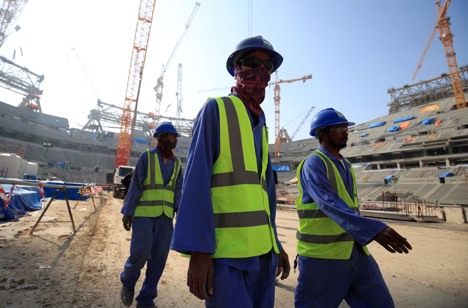 Construction workers at the Lusail Stadium in Lusail, Qatar. (Photo by Adam Davy/PA Images via Getty Images)