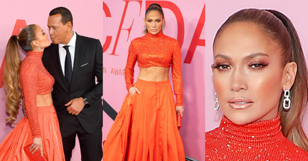 49-letnia Jennifer Lopez w pomarańczowym zestawie Ralph Lauren pozuje z narzeczonym na gali CFDA