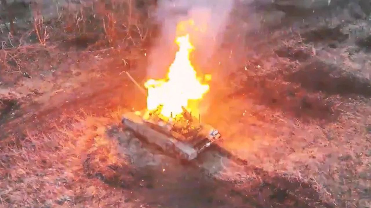 A burning Russian T-90 tank somewhere in Ukraine, illustrative photo