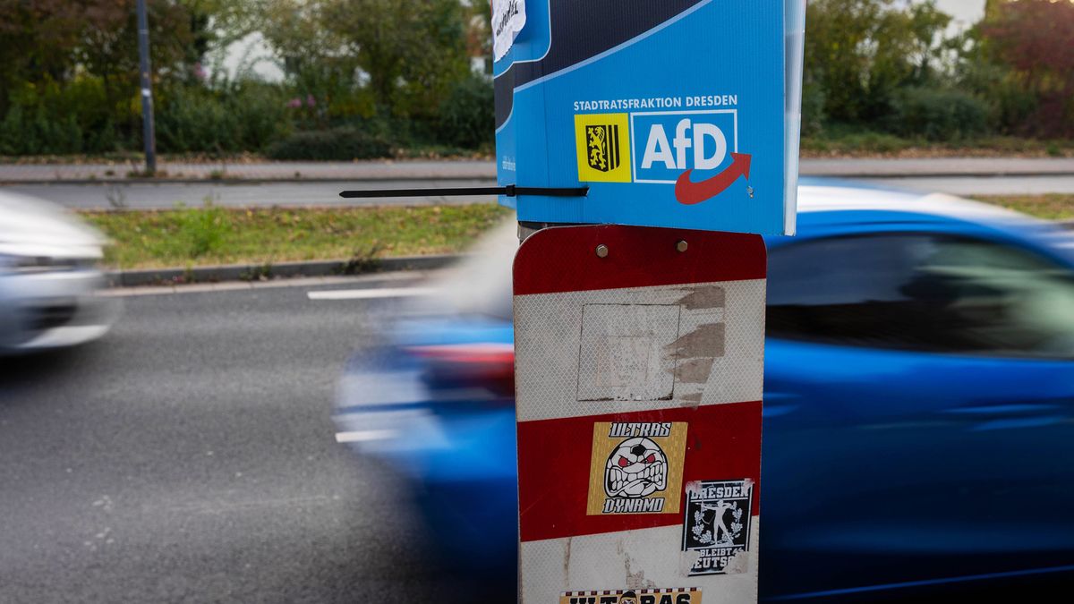 An advertisement for the Alternative für Deutschland (AfD) party on a lamp post in Dresden, Germany, on Wednesday, Oct. 18, 2023. As the European Union's biggest economy wrestles with a persistent slump and a surge in immigration, the specter of German nationalism has returned, leaving citizens more conflicted over their country's direction than at any point since World War II. Photographer: Krisztian Bocsi/Bloomberg via Getty Images