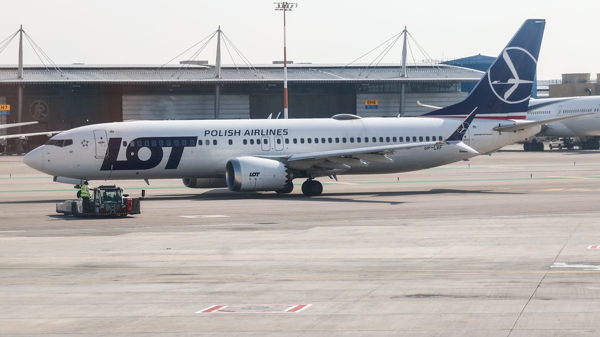 LOT Polish Airlines plane is seen at the Ben Gurion International Airport in Tel Aviv on December 31, 2022. (Photo by Jakub Porzycki/NurPhoto via Getty Images)