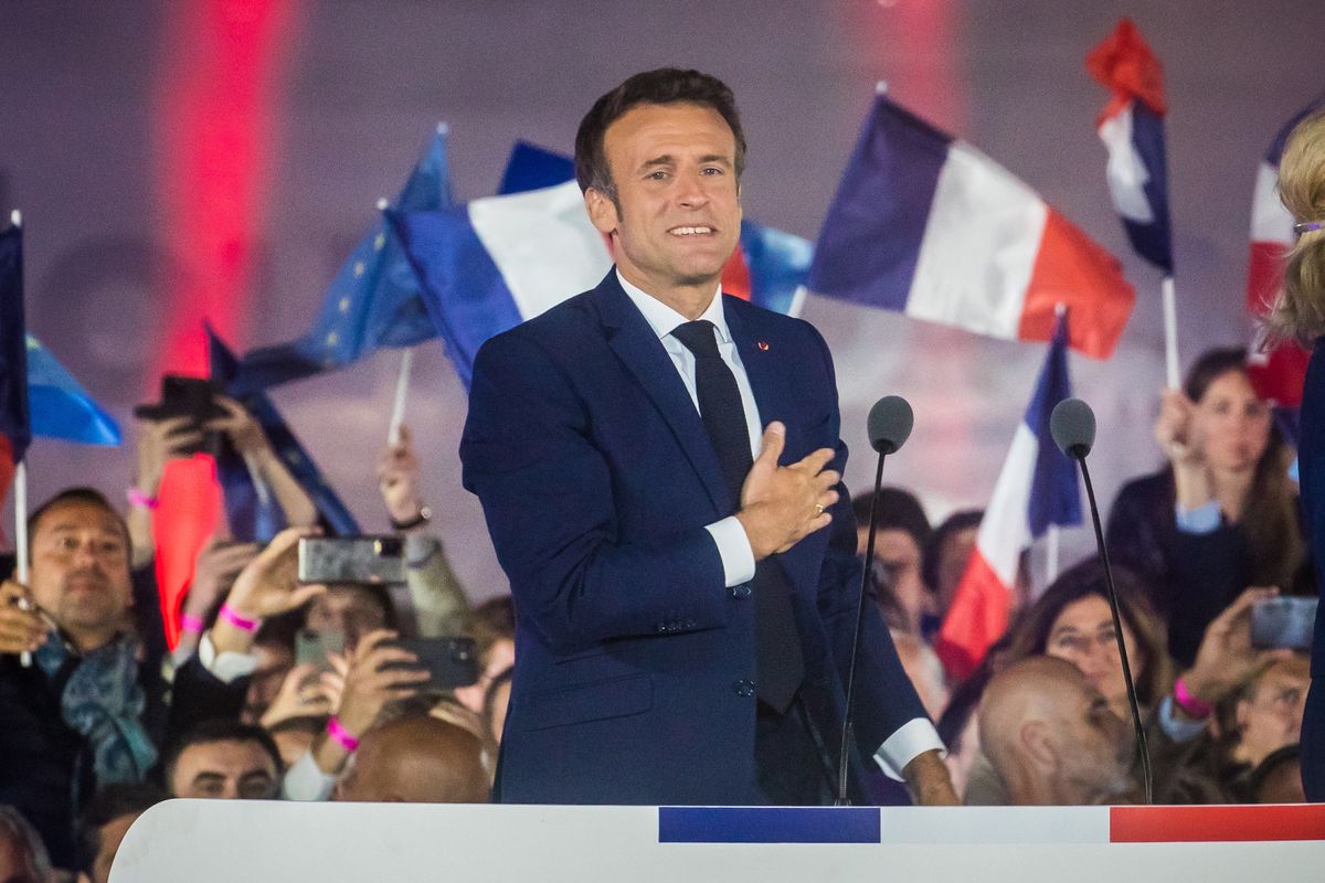 French President Emmanuel Macron reacts during his speech after winning the second round of the French presidential elections at the Champs-de-Mars after Emmanuel Macron won the second round of the French presidential elections in Paris, France, 24 April 2022 (issued 25 April 2022). Emmanuel Macron defeated Marine Le Pen in the final round of France's presidential election, with exit polls indicating that Macron is leading with approximately 58 percent of the vote. EPA/Christophe Petit Tesson Dostawca: PAP/EPA.