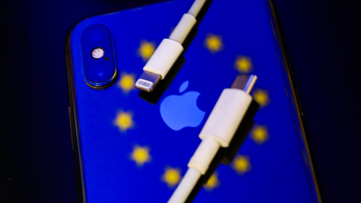 Lightning and USB-C cables are seen with European Union flag reflected on Apple iPhone in this illustration photo taken in Krakow, Poland on September 25, 2021. (Photo by Jakub Porzycki/NurPhoto via Getty Images)
