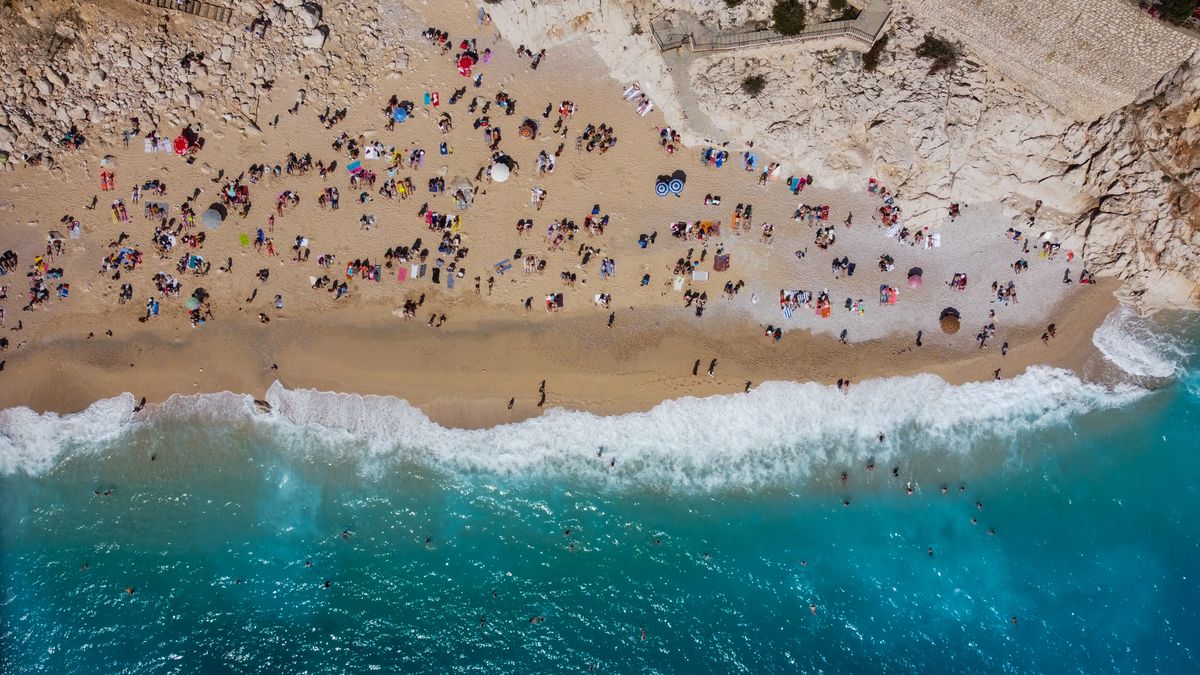 ANTALYA, TURKEY - 2024/04/10: (EDITOR'S NOTE: Image taken with a drone) General view of Kaputa beach. Kaputa Beach in Antalya is a canyon mouth beach located between the coastal road between Ka and Kalkan districts of the city. The water appears turquoise in color because it flows underground and filters through the sand. It is among the most popular tourist beaches in Antalya. (Photo by Tunahan Turhan/SOPA Images/LightRocket via Getty Images)