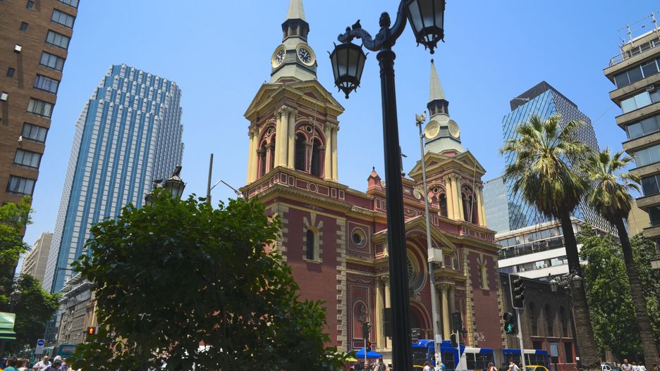 Contrast of old and new architecture and Basilica de La Merced in the city centre of Santiago, Chile. Santiago de Chile, Chile. (Photo by: Ben Seelt/Design Pics Editorial/Universal Images Group via Getty Images)
