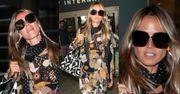 Wypoczęta Heidi Klum zasuwa w japonkach po lotnisku