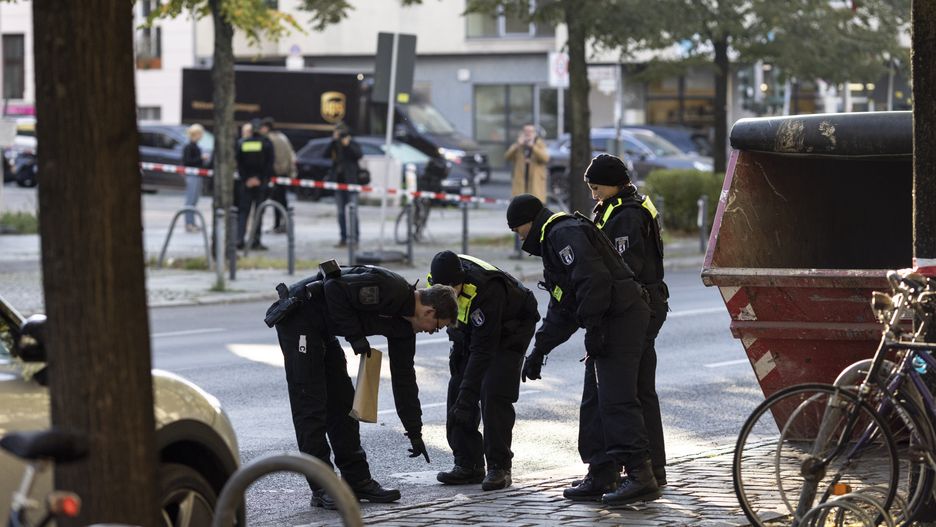 BERLIN, GERMANY - OCTOBER 18: Police stand outside a building that houses a synagogue and school of the Kahal Adass Jisroel Jewish community as they investigate a pre-dawn attack on October 18, 2023 in Berlin, Germany. According to police unidentified assailants threw Molotov cocktails towards the building at around 3:00 this morning. No damage or injuries resulted, as the fuel-filled bottles landed on the sidewalk in front of the building. Tensions are on the rise in Berlin, given the city's large Muslim communities that include many Palestinians and Arabs, due to the ongoing conflict between Hamas and Israel and especially since yesterday's bombing of a hospital in Gaza. (Photo by Maja Hitij/Getty Images)