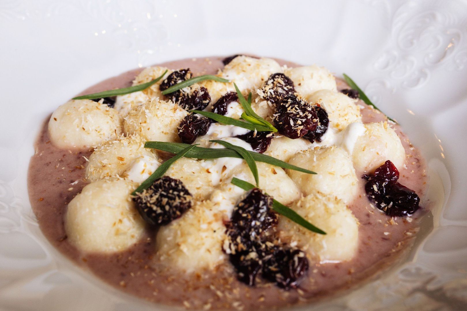 Plate with lazy dumplings with berries. Traditional ukrainian cuisine