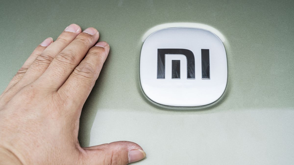 NANNING, CHINA - MAY 1, 2024 - Visitors look at the Xiaomi SU7 at the Xiaomi Auto show at the 27th Beibu Gulf (Nanning) 2024 Auto Show in Nanning, South China's Guangxi Zhuang Autonomous region, May 1, 2024. (Photo credit should read CFOTO/Future Publishing via Getty Images)