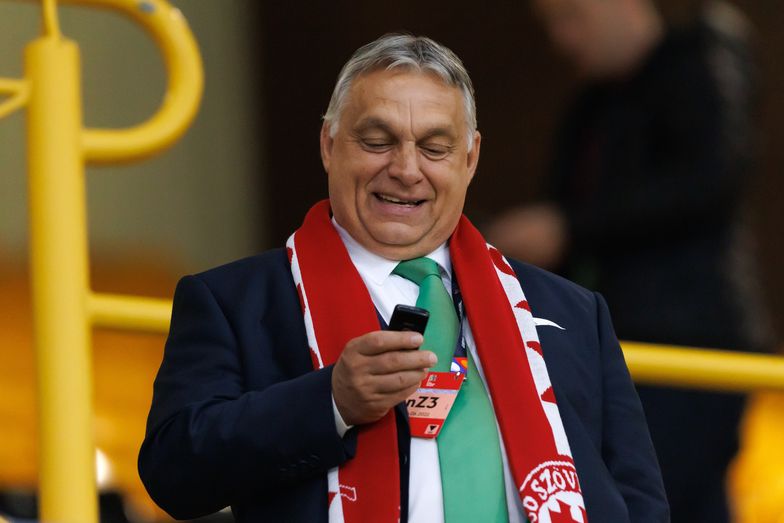 WOLVERHAMPTON, ENGLAND - JUNE 14:  Viktor Orban Prime Minister of Hungary reacts as he looks at his mobile phone during the UEFA Nations League League A Group 3 match between England and Hungary at Molineux on June 14, 2022 in Wolverhampton, United Kingdom. (Photo by Marc Atkins/Getty Images)