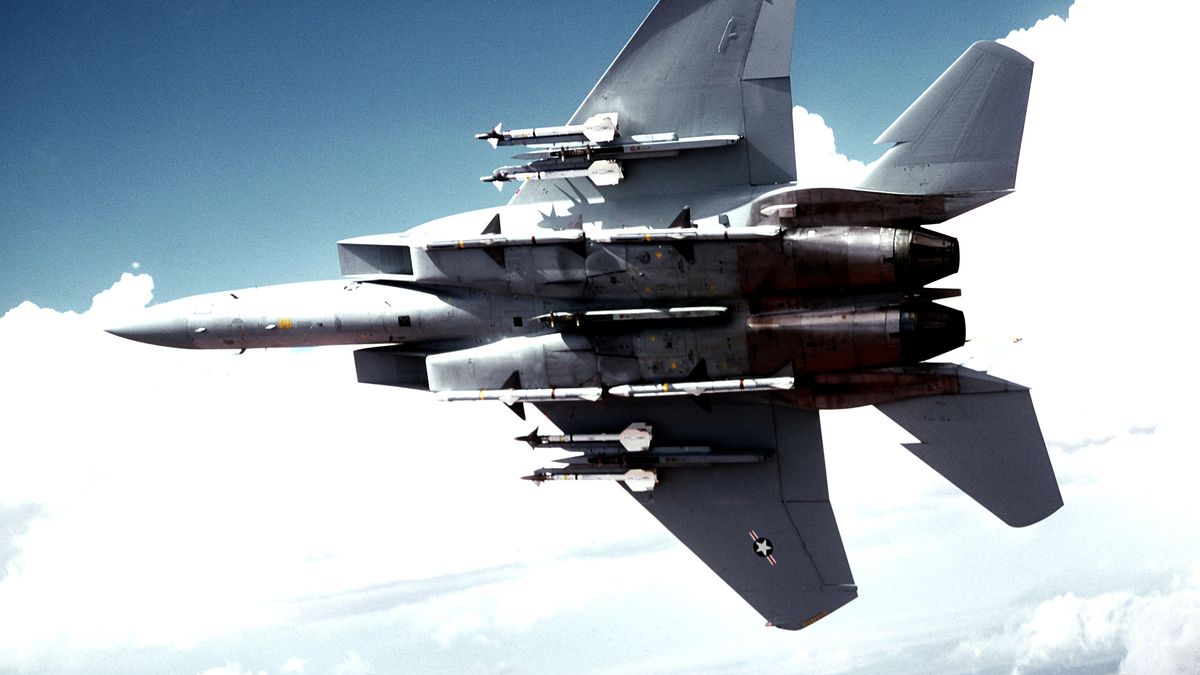 Bottom view of an F-15 Eagle aircraft armed with AIM-9 Sidewinder and AIM-7 Sparrow missiles, in flight Wing. (Photo by: HUM Images/Universal Images Group via Getty Images)
