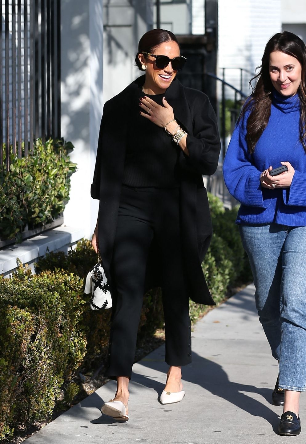 Uśmiechnięta Meghan Markle maszeruje ulicami Los Angeles