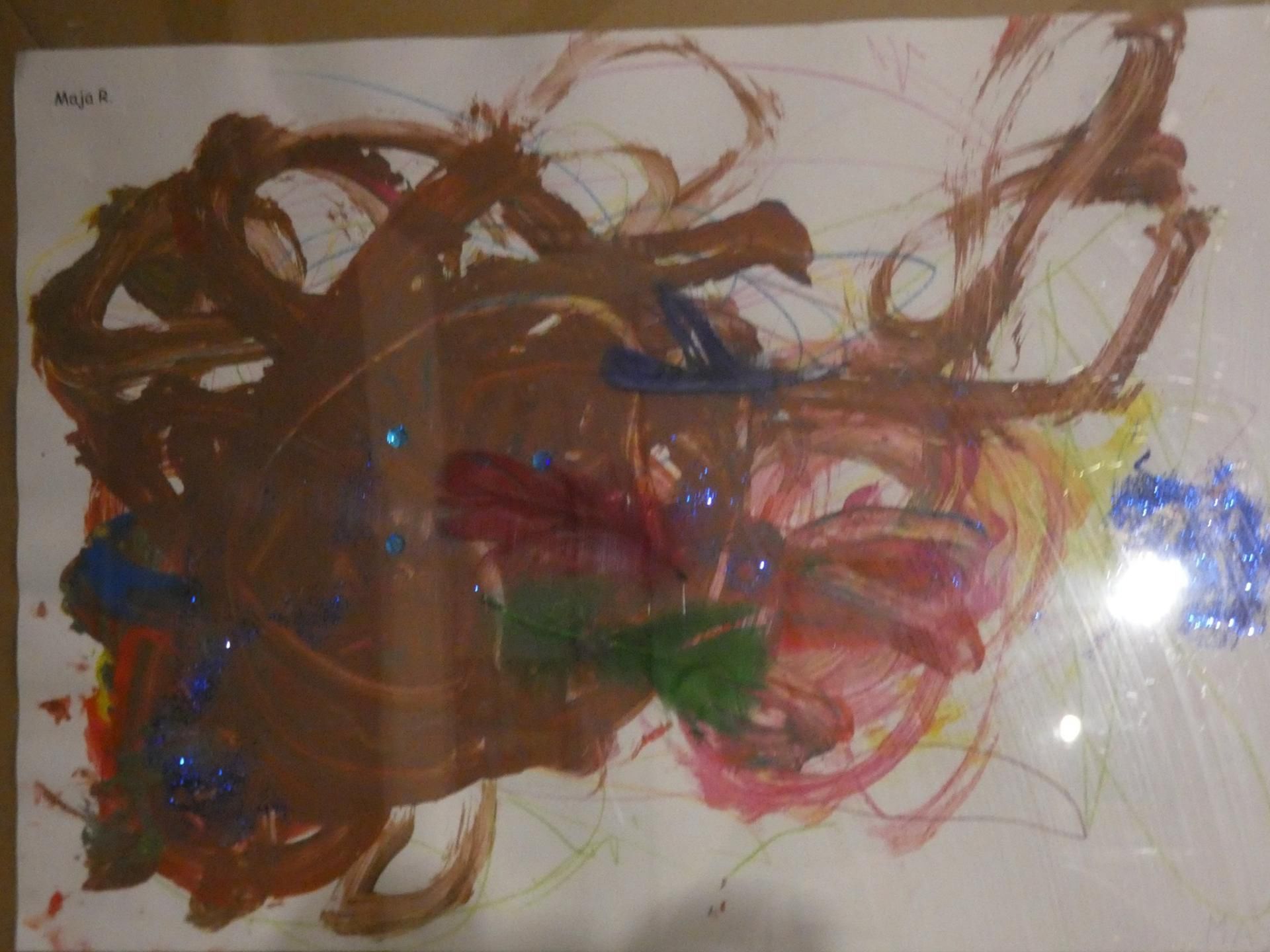 Ozdobiona piórkami praca Mai