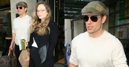Henry Cavill opuszcza hotel w towarzystwie CIĘŻARNEJ partnerki (ZDJĘCIA)