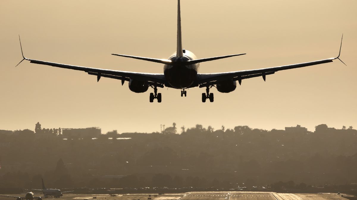 SAN DIEGO, CALIFORNIA - MAY 10:   An Alaska Airlines Boeing 737 MAX 9 airplane approaches San Diego International Airport for a landing on May 10, 2025 in San Diego, California.  (Photo by Kevin Carter/Getty Images)