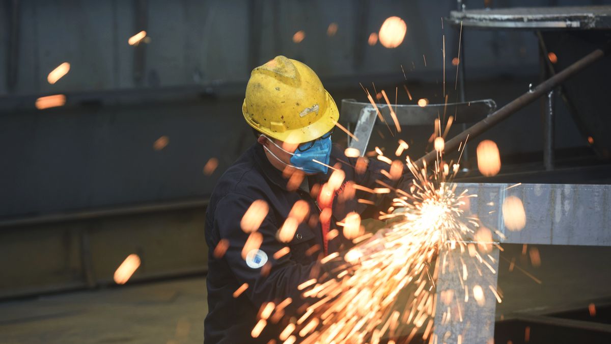 HANGZHOU, CHINA - MARCH 27, 2024 - A worker is working on a self-developed water surface cleaning long-arm environmental protection ship at a shipping company's plant to meet the needs of domestic lake and reservoir water surface environment cleaning in Hangzhou, Zhejiang province, China, March 27, 2024. Data released by the National Bureau of Statistics on the same day showed that from January to February 2024, the total profit of industrial enterprises above designated size across the country reached 914.06 billion yuan, an increase of 10.2% year-on-year. (Photo credit should read CFOTO/Future Publishing via Getty Images)