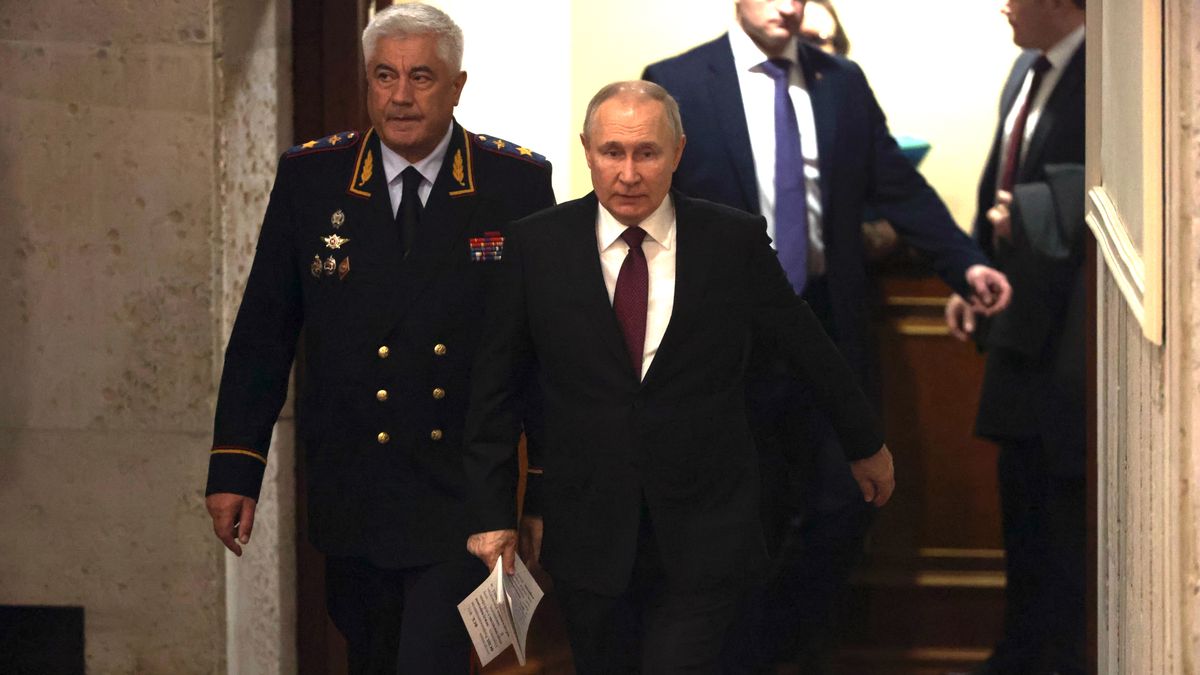 MOSCOW, RUSSIA - MARCH 20: (RUSSIA OUT) Russian President Vladimir Putin (R) and Interior Minister Vladimir Kolokoltsev (L) enter the hall during the Expanded Board Meeting at the Interior Ministry on March 20, 2023, in Moscow, Russia. Putin delivered an annual speech to top officers of the Interior Ministry and urged to stop illegal street actions and the spread of "extremist ideology". (Photo by Contributor/Getty Images)