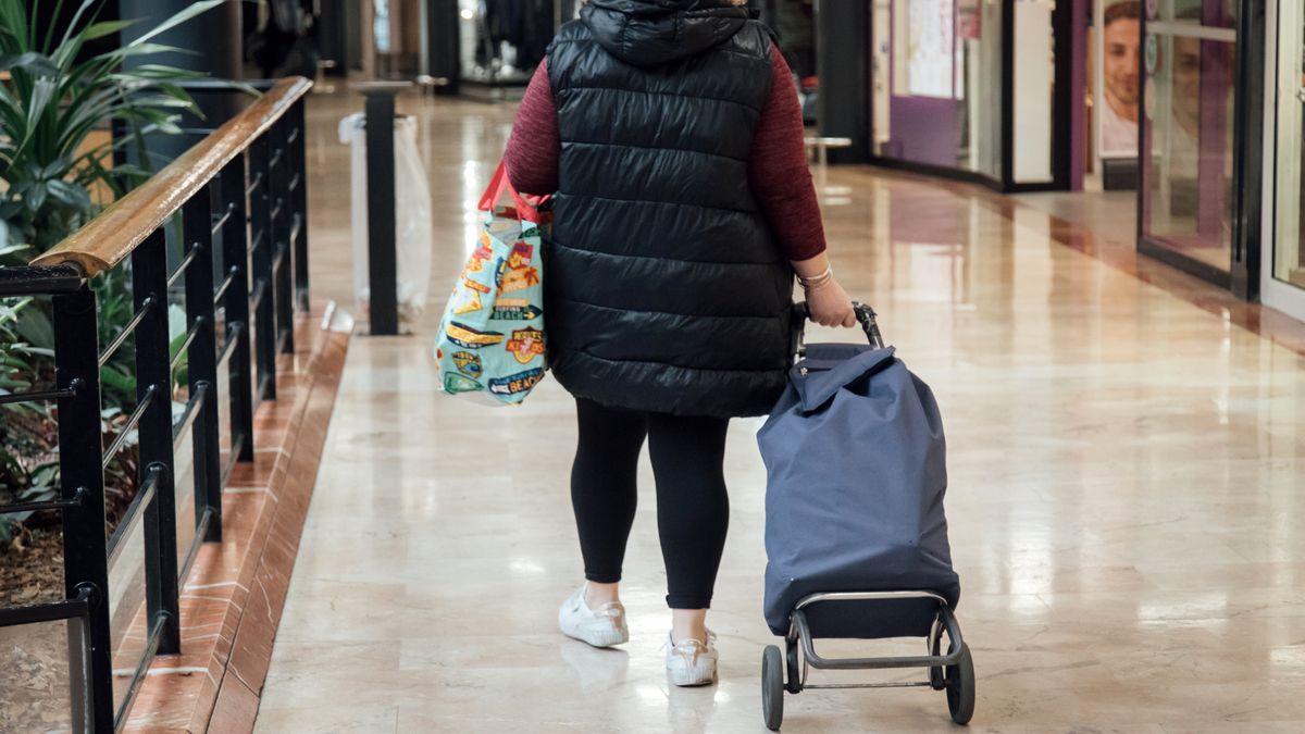 A customer with a shopping trolley outside an Auchan SA supermarket in Paris, France, on Monday, Oct. 10, 2022. Food prices have overtaken energy as the biggest factor behind inflation in France, according to the latest forecasts from statistics agency Insee. Photographer: Cyril Marcilhacy/Bloomberg via Getty Images