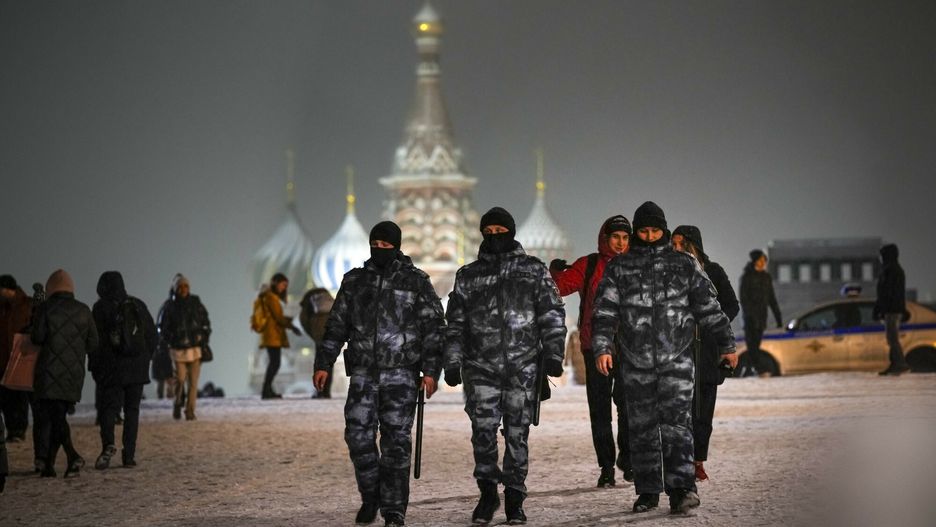 Temporary
Russian riot police officers walk through a snow covered Red Square with the St. Basil's Cathedral in Moscow, Russia, Monday, Dec. 13, 2021. (AP Photo/Alexander Zemlianichenko)
AP