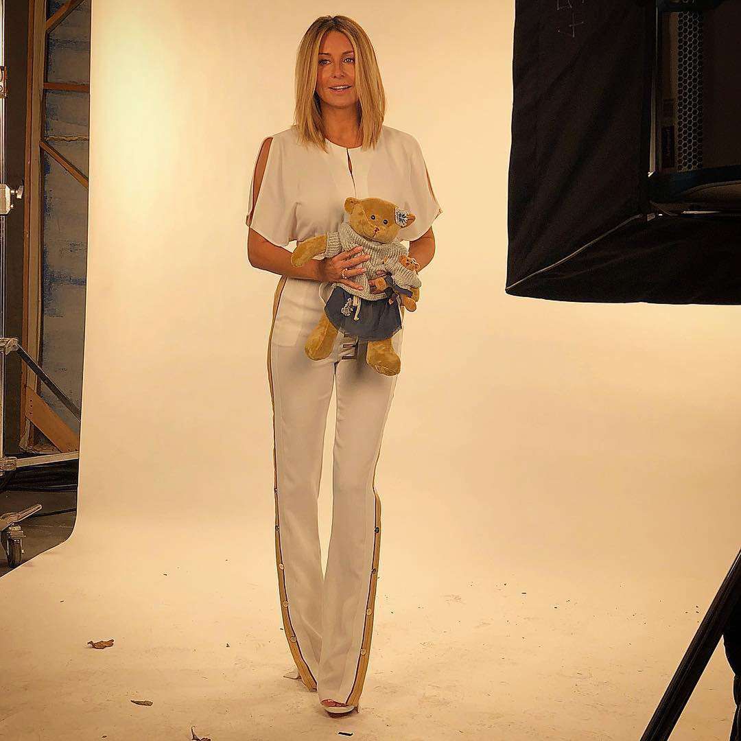 Małgorzata Rozenek w białym kombinezonie