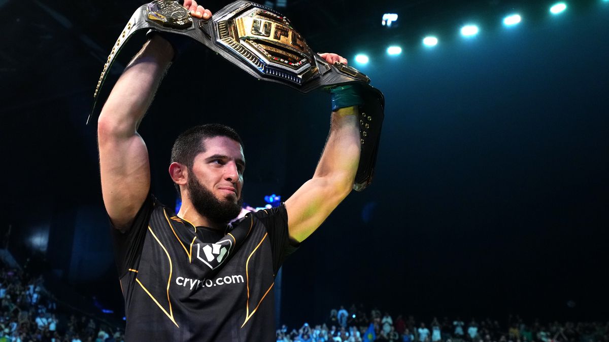 ABU DHABI, UNITED ARAB EMIRATES - OCTOBER 22: Islam Makhachev of Russia celebrates after his victory over Charles Oliveira of Brazil in their UFC lightweight championship fight during the UFC 280 event at Etihad Arena on October 22, 2022 in Abu Dhabi, United Arab Emirates. (Photo by Chris Unger/Zuffa LLC)