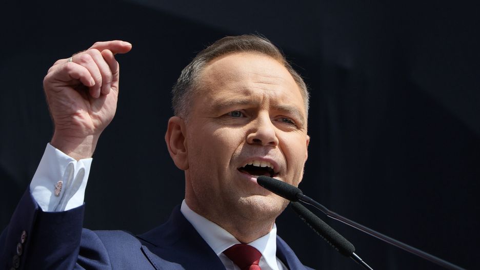 Karol Nawrocki
Warszawa, 25.05.2025. Wybory prezydenta RP - kampania przed II tur�. "Wielki Marsz za Polsk�", 25 bm. zwolennik�w kandydata Komitetu Obywatelskiego w wyborach prezydenckich, popieranego przez PiS prezesa IPN Karola Nawrockiego w II turze wybor�w na fotel prezydenta RP. Jego trasa wiedzie z ronda gen. de Gaulla na plac Zamkowy. Uczestniczy Karol Nawrocki. (amb) PAP/Pawe� Supernak
Pawe� Supernak
kampania, marsz, Wielki Marsz za Polsk�, wybory prezydenckie