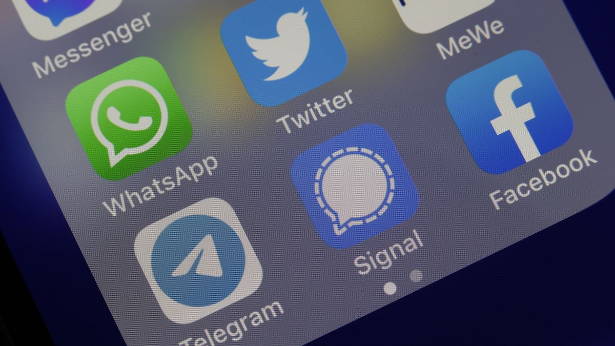 PARIS, FRANCE - JANUARY 13: In this photo illustration, the logos of social media applications Messenger, WhatsApp, Twitter, MeWe, Telegram, Signal and Facebook are displayed on the screen of an iPhone on January 13, 2021 in Paris, France. Since WhatsApp announced a change to its privacy rules, users are moving to other encrypted messaging, 25 million users have joined Telegram secure messaging in the past 72 hours, Russian founder Pavel Durov announced on Tuesday. (Photo illustration by Chesnot/Getty Images)