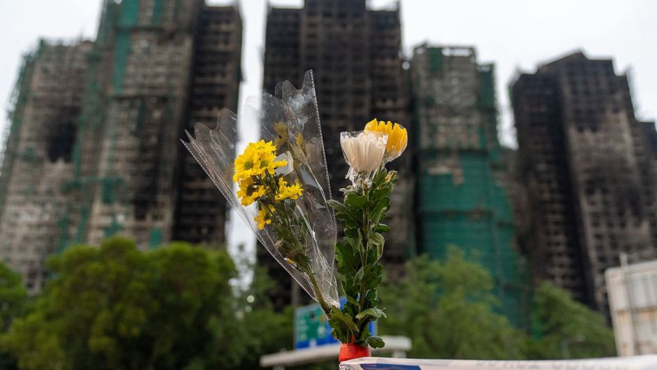 Hong Kong Grieves Vicitims Of Tragic Apartment Fire
HONG KONG, CHINA - NOVEMBER 30: A bouquet of flowers is seen in front of the Wang Fuk Court in the aftermath of the deadly fire in Hong Kong's Tai Po district on November 30, 2025 in Hong Kong, China. Hong Kong is observing three days of official mourning for the victims of the fatal apartment fire that claimed 128 lives. (Photo by Anthony Kwan/Getty Images)
Anthony Kwan