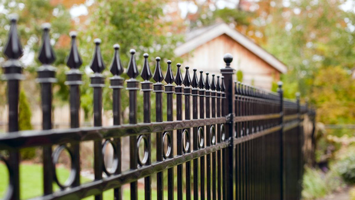 Iron FenceA rod iron fence in a back yard - very shallow depth of field.ballycroy"Residential Structure, Nobody, Security System, Spiked, Color Image, Dividing, Protection, Solitude, Separation, Elegance, Security, Iron, Steel, Metal, Pattern, Selective Focus, Defocused, Urban Scene, Full Frame, Horizontal, Close-up, Front or Back Yard, Fence, Boundary, Residential District, rod iron, Repeated Pattern, Picket, Architecture And Buildings, Architectural Detail, Homes"